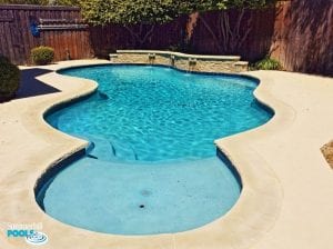 freeform pool with wall of scuppers