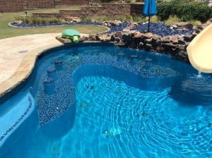 swim up bar inside pool with decorative turtle