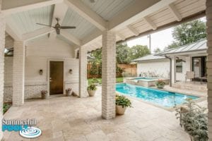 outdoor kitchen and backyard pool