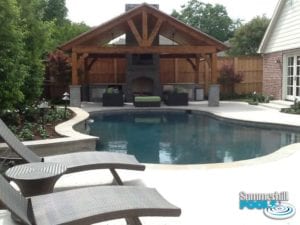 outdoor kitchen and backyard pool