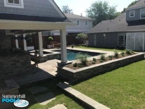 outdoor kitchen and backyard pool