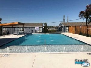 commercial pool with tanning ledge