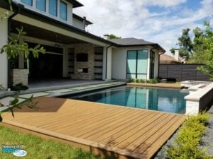 new pool with wood decking