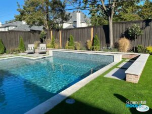 Modern pool with blue tile