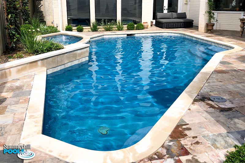 close up of a water feature on a pool